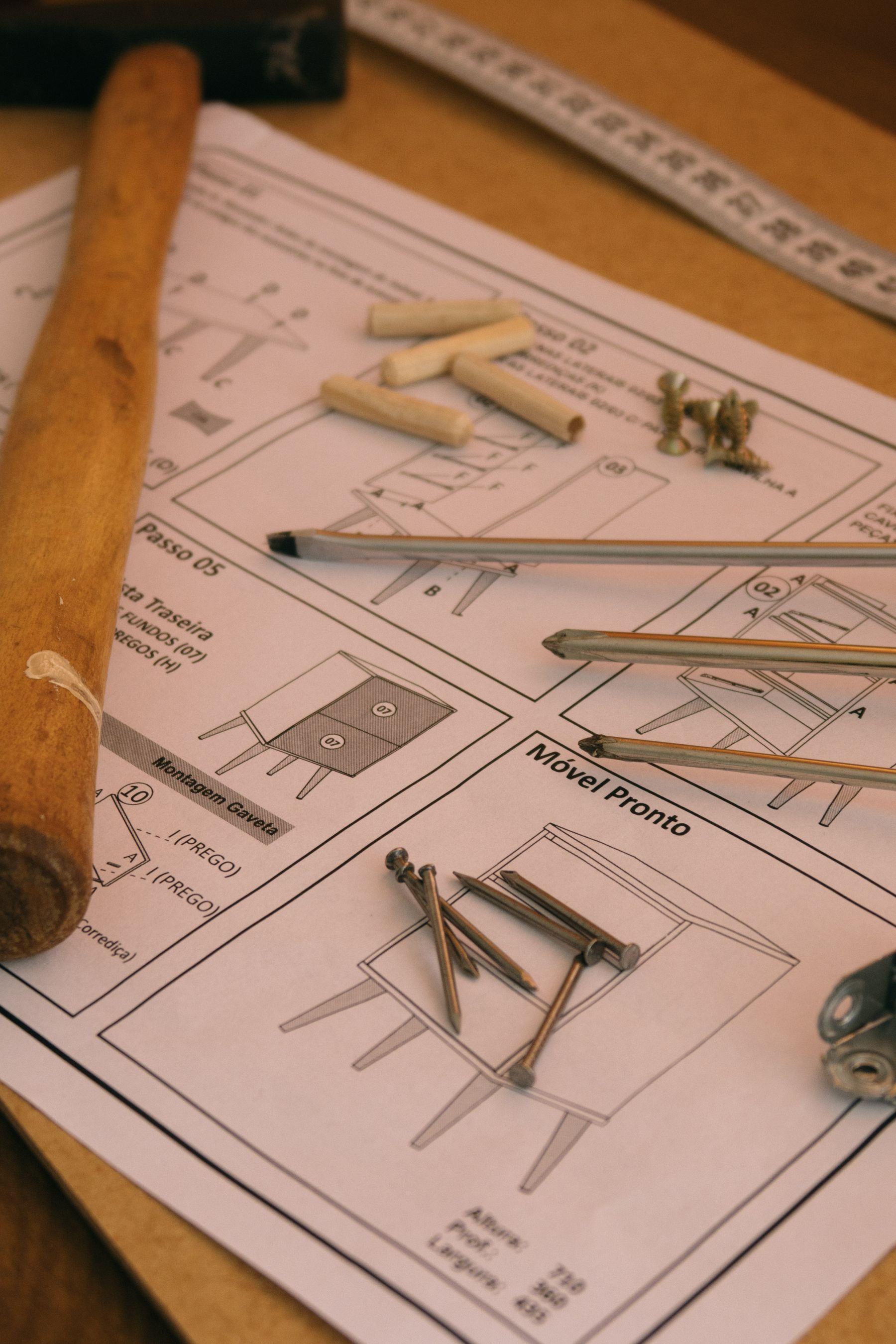 Furniture assembly instructions, screws, dowels, and tools